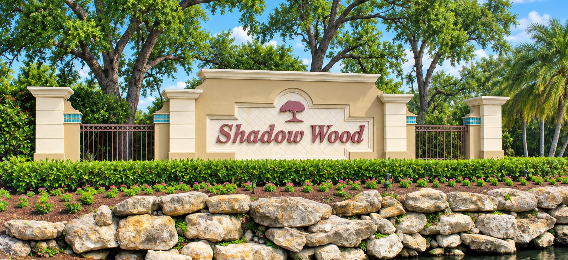 The entrance at Shadow Wood Country Club, a gated golf community in Bonita Springs, Florida, built around a lake.