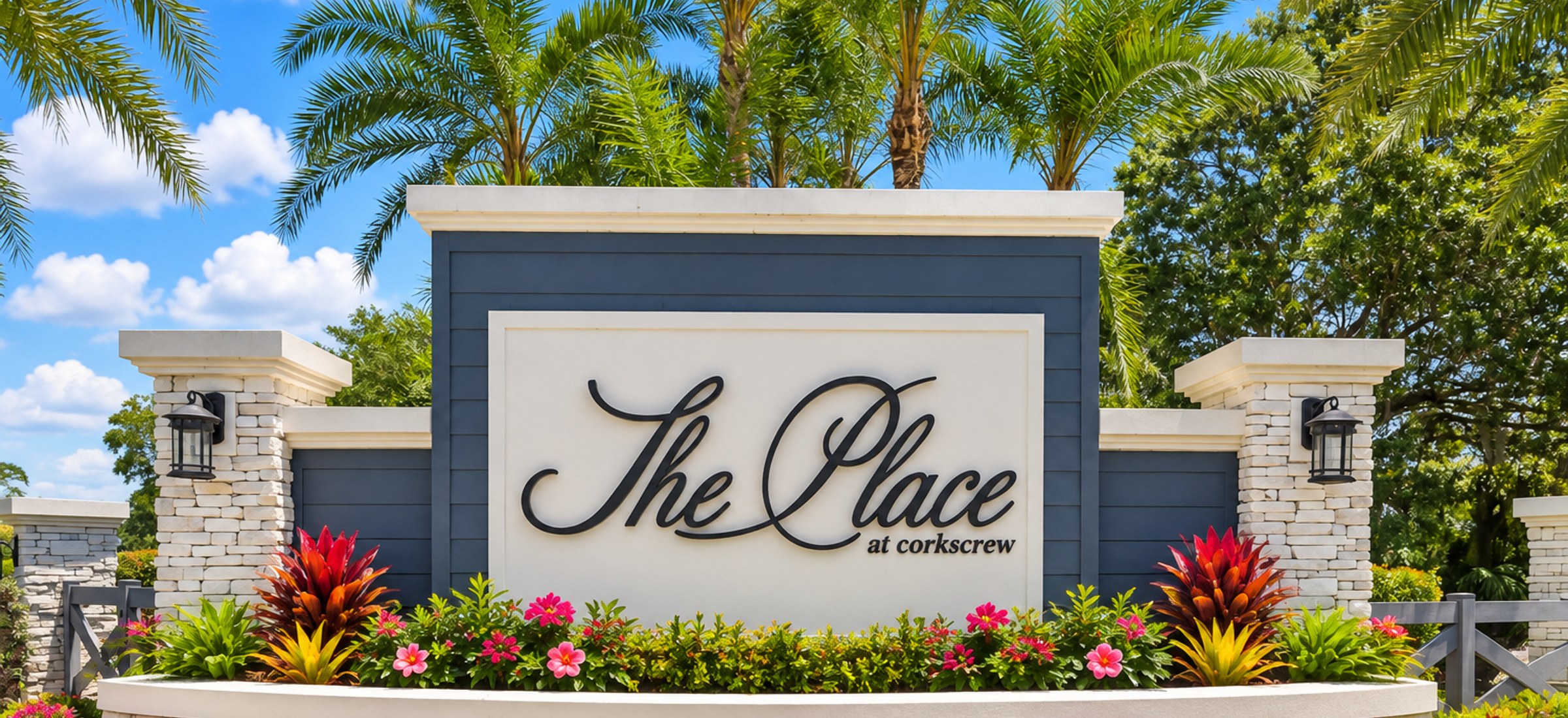 The entrance at The Place at Corkscrew, a gated community in Estero, Florida, built around a lake.